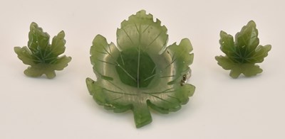 Lot 1274 - A cut green jade leaf brooch, length 3.3cm,...