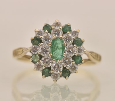 Lot 1281 - A 9ct yellow gold green and white stone...