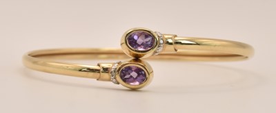 Lot 1427 - A 9ct yellow gold expanding bracelet, with a...