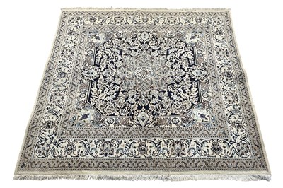 Lot 118 - A hand woven woollen ground cream and beige...