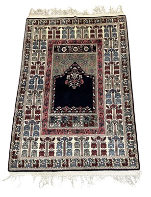 Lot 120 - A hand woven woollen ground Ghiordes carpet,...