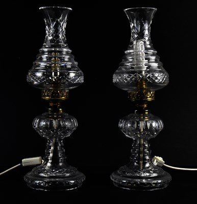 Lot 570 - WATERFORD; a pair of cut crystal table lamps,...