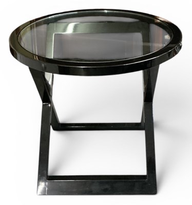 Lot 111 - A modern contemporary ebonised piano effect...