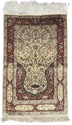 Lot 121 - A fine Iranian silk and woollen pile red...