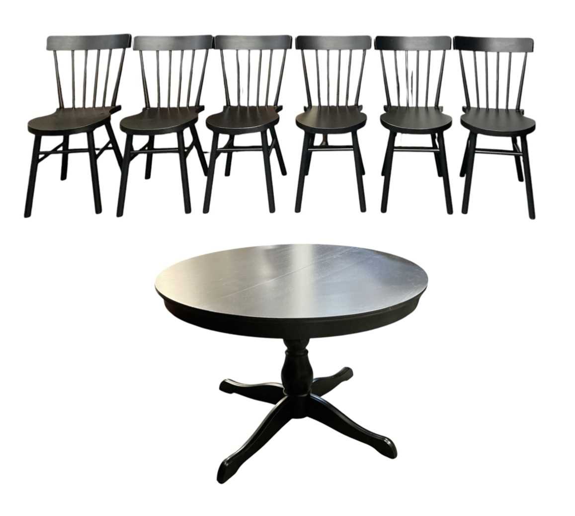Lot 36 - A modern contemporary ebonised circular...