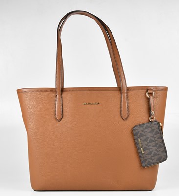 Lot 1280 - MICHAEL KORS; a tan pebbled leather large tote...