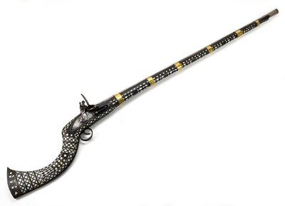 Lot 1116 - An Afghan flintlock musket, 1851, length 142cm.