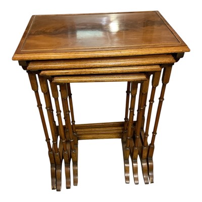 Lot 252 - An Edwardian walnut nest of four tables,...