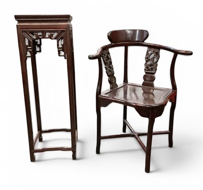 Lot 74 - A modern Chinese carved hardwood...