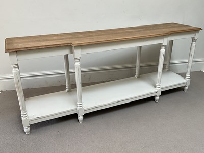 Lot 29 - OKA; a modern hall table with white painted...