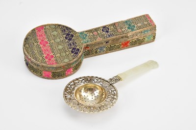 Lot 1147 - A Chinese sterling silver tea strainer with...