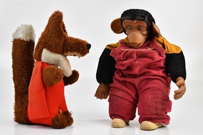 Lot 2072 - A talking Basil Brush plush toy and a monkey,...