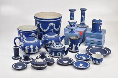 Lot 1368 - WEDGWOOD; a collection of dark blue jasperware...
