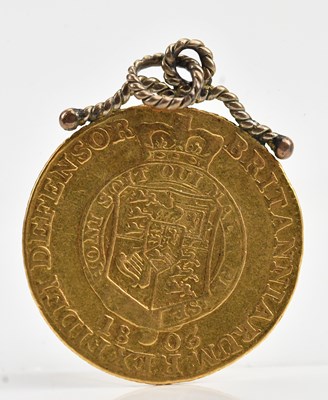Lot 543 - A George III half guinea, 1803.