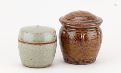 Lot 402 - MIKE DODD (born 1943); a lobed stoneware jar...