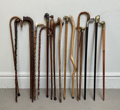 Lot 455 - A collection of seventeen walking sticks...