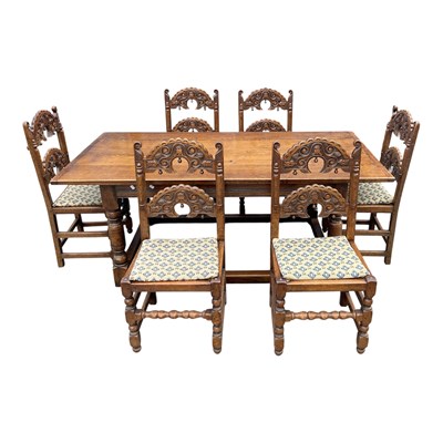 Lot 80 - A reproduction oak refectory dining table on...