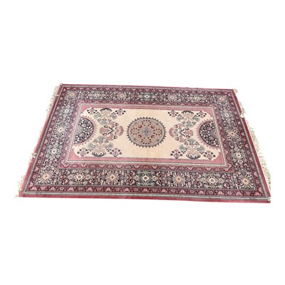 Lot 1405 - A large Eastern rug, with stylised decoration...