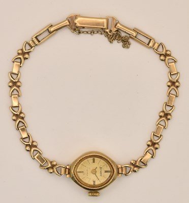 Lot 1521 - ACCURIST; a lady's 9ct yellow gold wristwatch,...