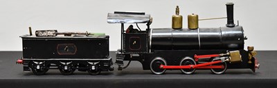 Lot 2214 - A live steam locomotive and tender, in need of...