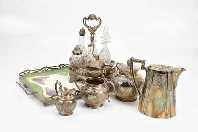 Lot 1473 - A Victorian silver plated bottle stand, a...