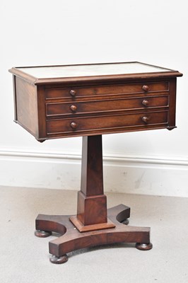 Lot 142 - A 19th century mahogany sewing table with...