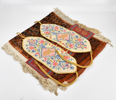 Lot 1486 - An Eastern prayer mat with stylised decoration,...