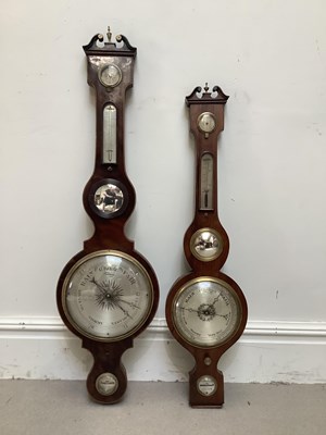 Lot 407 - A 19th century inlaid mahogany wheel barometer...