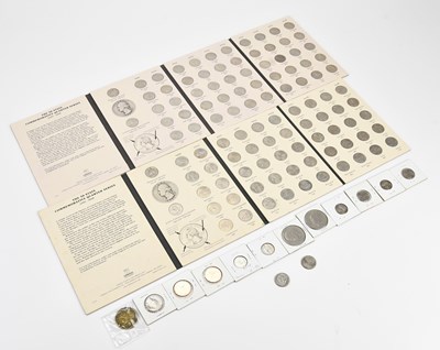 Lot 657 - A small collection of vintage coins including...