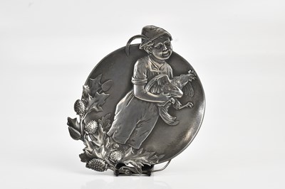 Lot 1493 - WMF; an Art Nouveau pewter plate decorated...