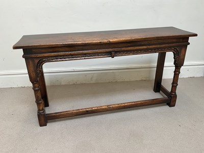 Lot 1100 - A reproduction oak rectangular hall table,...
