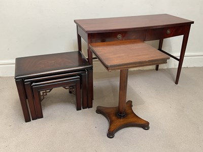Lot 1124 - A reproduction mahogany two drawer hall table,...