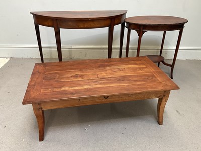 Lot 1125 - A reproduction demi-lune console table, an...