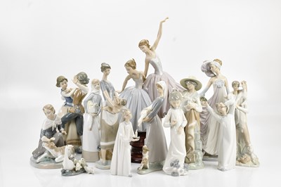 Lot 1236 - LLADRO; a collection of twelve figures,...