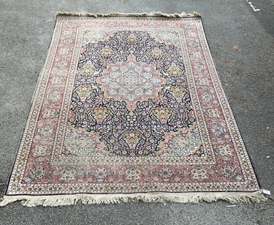 Lot 185 - A blue ground hand knotted woollen carpet with...