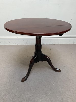 Lot 1314 - A mahogany tilt-top tripod table, diameter 77cm.