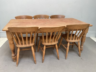 Lot 1065 - A pine farmhouse kitchen table, height 77cm,...