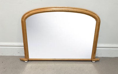 Lot 23 - A Victorian pine overmantel mirror, with...