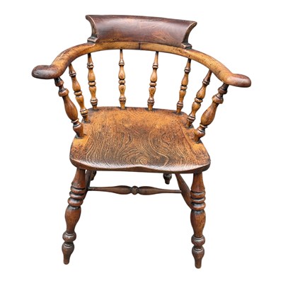 Lot 59 - A 19th century elm seated Smoker's Bow elbow...