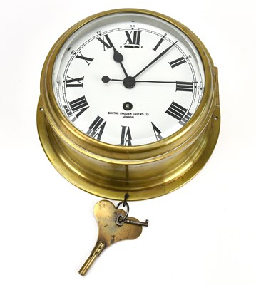 Lot 1361 - SMITHS ENGLISH CLOCKS; a brass bulkhead clock,...