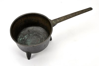 Lot 471 - BAYLEY & STREET; a bronze skillet, length 52cm.