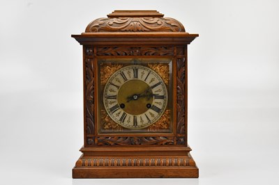 Lot 346 - A late 19th century carved oak eight day...