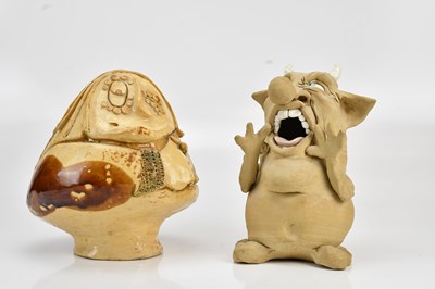 Lot 1397 - SUE HALL; a grotesque pottery model, incised...