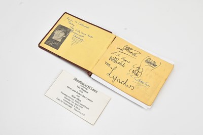 Lot 301 - An autograph book including entries for...