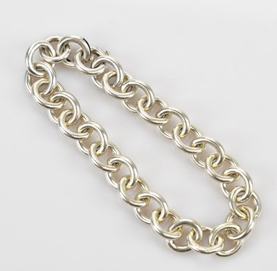 Lot 34 - TIFFANY & CO; a sterling silver hoop link...