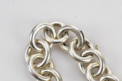 Lot 34 - TIFFANY & CO; a sterling silver hoop link...