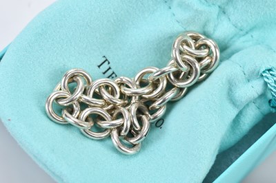 Lot 34 - TIFFANY & CO; a sterling silver hoop link...
