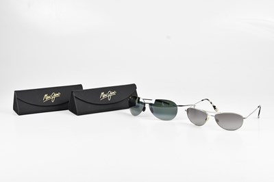 Lot 1299 - MAUI JIM; two pairs of tinted sunglasses, one...