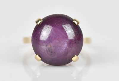 Lot 455 - A yellow metal star ruby dress ring, the star...