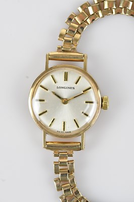 Lot 1142 - LONGINES; a lady's 9ct gold cased wristwatch,...